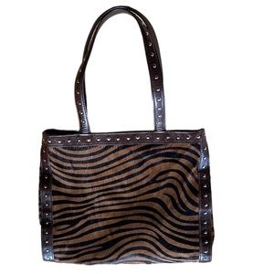 Zebra print calfskin purse.  Like new, no flaws.